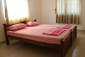 Shantham Service Apartments, Kinathukadavu