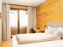 Cosy Apartment in Schrocken With Balcony