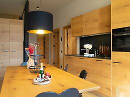 Cosy Apartment in Schrocken With Balcony