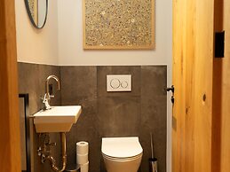 Cosy Apartment in Schrocken With Balcony