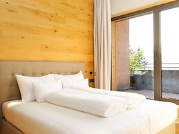 Cosy Apartment in Schrocken With Balcony