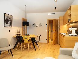 Cosy Apartment in Schrocken With Balcony