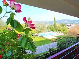 Belvilla by OYO Comfortable Apartment With Pool