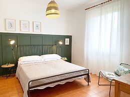 Belvilla by OYO Comfortable Apartment With Pool