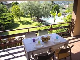 Belvilla by OYO Comfortable Apartment With Pool