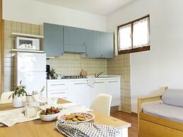 Belvilla by OYO Comfortable Apartment With Pool