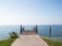 Belvilla by OYO Comfortable Apartment With Pool