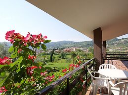 Belvilla by OYO Comfortable Apartment With Pool