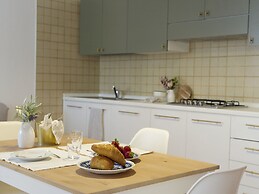 Belvilla by OYO Comfortable Apartment With Pool