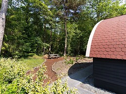 House With a Terrace on the Edge of the Forest