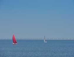 Modern Chalet on the Water at a Holiday Park