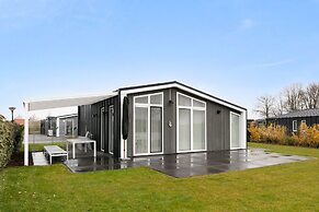 Chalet in Zeeland by Scenic Pond