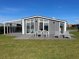 Chalet in Zeeland by Scenic Pond