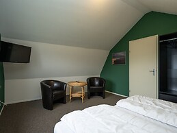 Holiday Home in De Cocksdorp With Garden