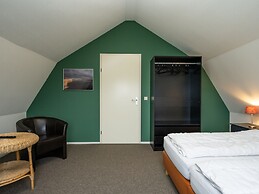 Holiday Home in De Cocksdorp With Garden