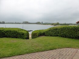 Lakeside Chalet Retreat in Green Setting