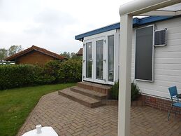 Lakeside Chalet Retreat in Green Setting