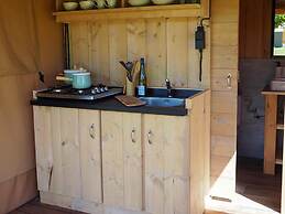 Nice Safari Tent With Bathroom on a Holiday Park Near Lauwersmeer Nati