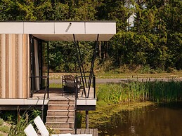 Modern Lodge on the Water in a Holiday Park