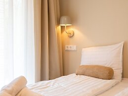 Modern Lodge on the Water in a Holiday Park