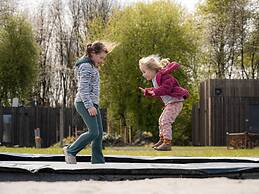 Modern Lodge on the Water in a Holiday Park