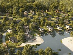 Modern Lodge on the Water in a Holiday Park