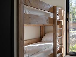 Modern Lodge on the Water in a Holiday Park