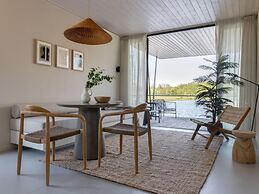 Modern Lodge on the Water in a Holiday Park