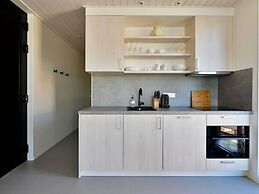 Modern Lodge on the Water in a Holiday Park