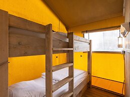 Nice Safari Tent With Bathroom at a Holiday Park Near Lauwersmeer Nati