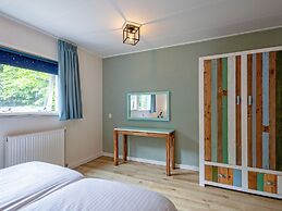 Cozy Holiday Home in Den Burg With hot tub