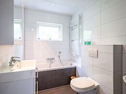 Cozy Holiday Home in Den Burg With hot tub