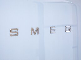 Cozy Holiday Home in Den Burg With hot tub