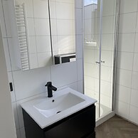 Modern Chalet With a Dishwasher in Lathum