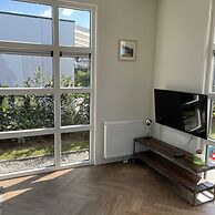 Modern Chalet With a Dishwasher in Lathum