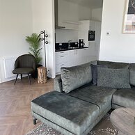 Modern Chalet With a Dishwasher in Lathum