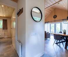 Forest Lodge in Nature With Pond Views