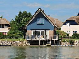 Waterfront Villa With Sauna on a Holiday Park