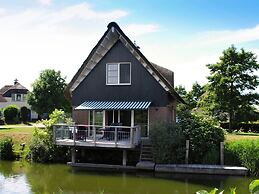 Waterfront Villa With Sauna on a Holiday Park
