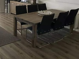 Apartment With Balcony on the Upper Floor
