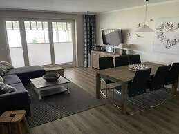 Apartment With Balcony on the Upper Floor