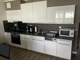 Apartment With Balcony on the Upper Floor