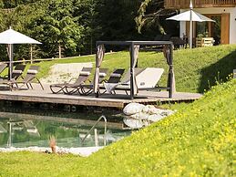 Nice Chalet in Wolting With Natural Swimming Pond