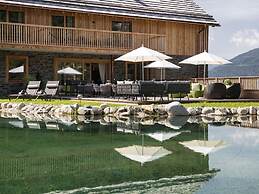 Nice Chalet in Wolting With Natural Swimming Pond