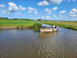 Nice Frisian Family Villa on the Water