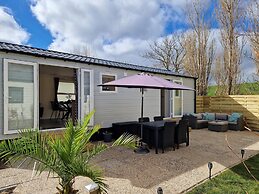 Cozy Chalet With Spacious Garden on a Holiday Park