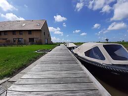 Spacious Frysian Villa on the Waterfront