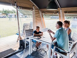 Nice Tent Lodge on a Campsite on a Lake