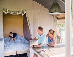 Nice Tent Lodge on a Campsite on a Lake