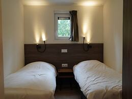 Beautiful Chalet With a Fireplace in a Wooded Area